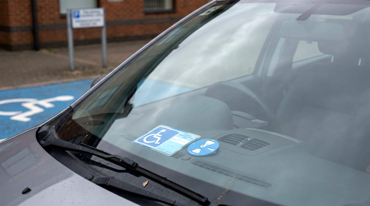 A child's Blue Badge with the wheelchair symbol and clock dial displayed on a UK car dashboard. AI-generated illustration.